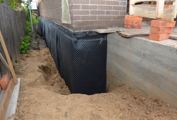 SJ Waterproofing Pros technician performing targeted Waterproofing assessment in Taylorsville, NC